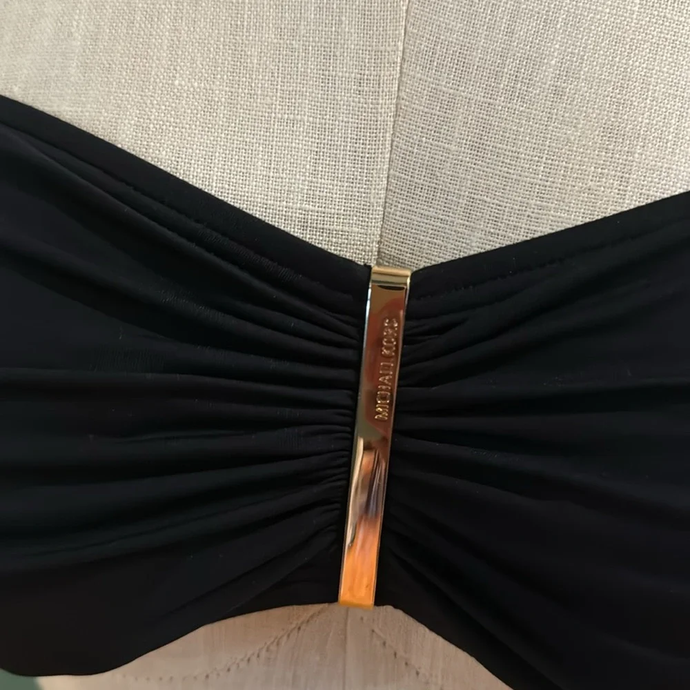 Women’s Michael Kors black swim top. Large‎